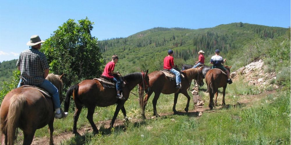 horseback-slide-2-bec5d284 image horseback-slide-2-bec5d284 Horseback Rides - Colorado Activities - Book Today!